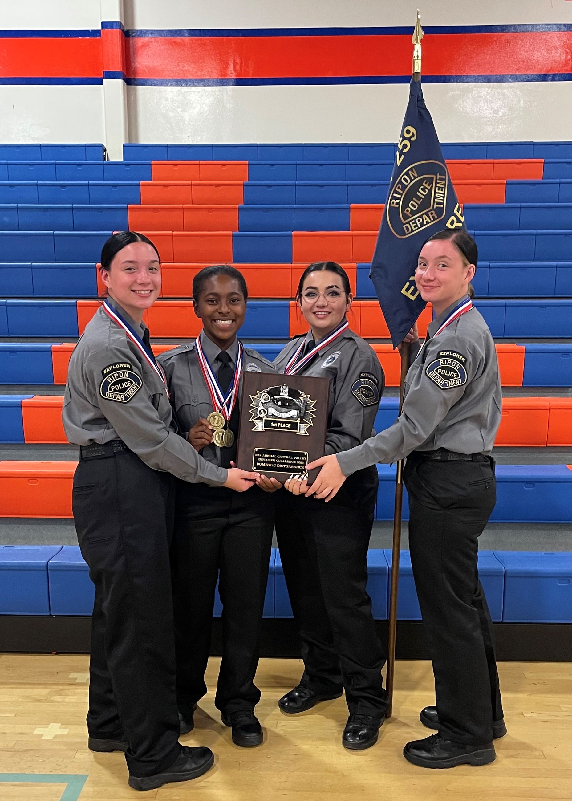 Explorers holding award