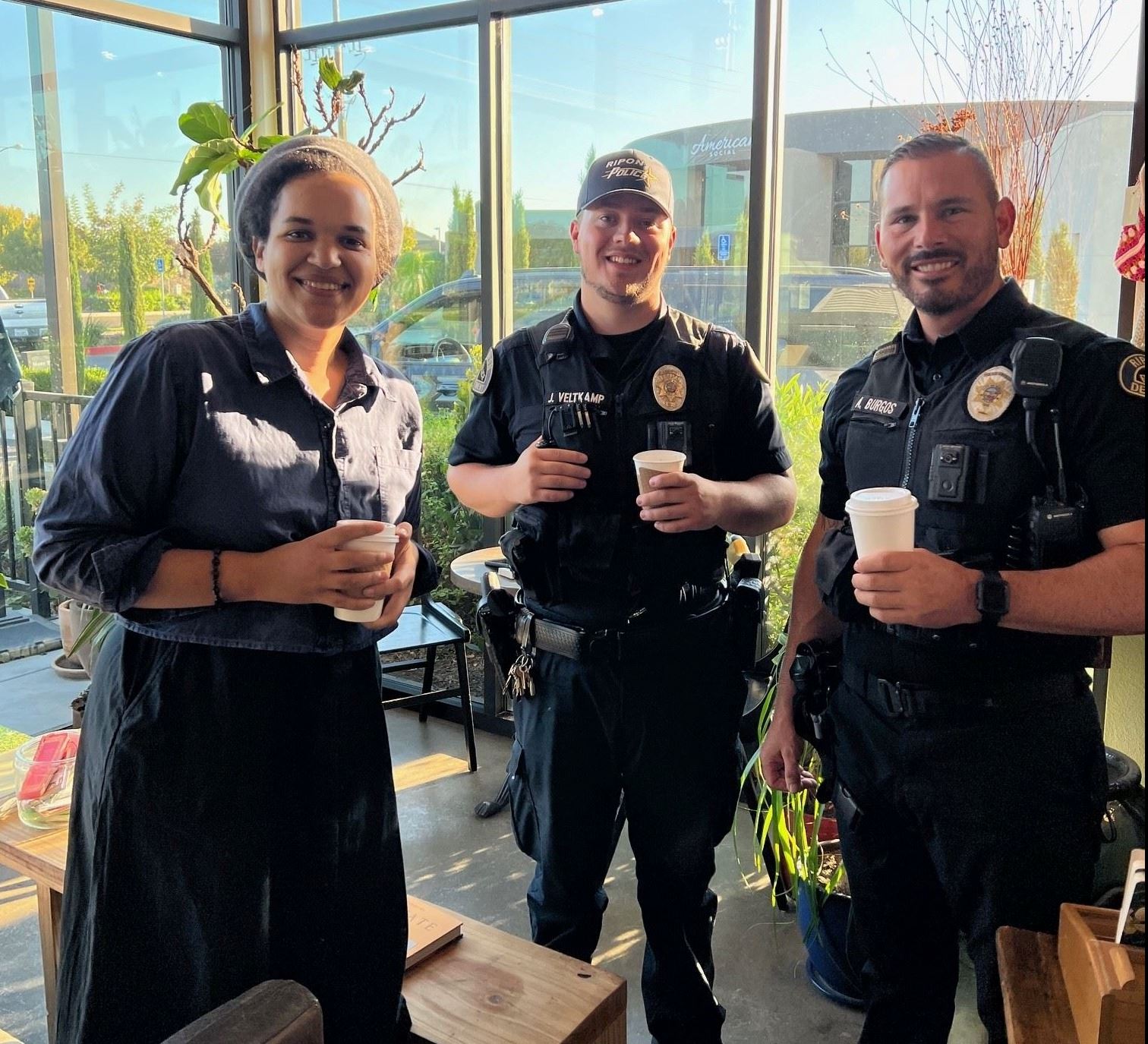 Police officers at Austin's Coffee Crafters